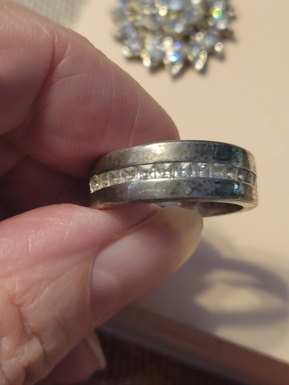 Silver Tone Ring with Channel-Set Clear Stones